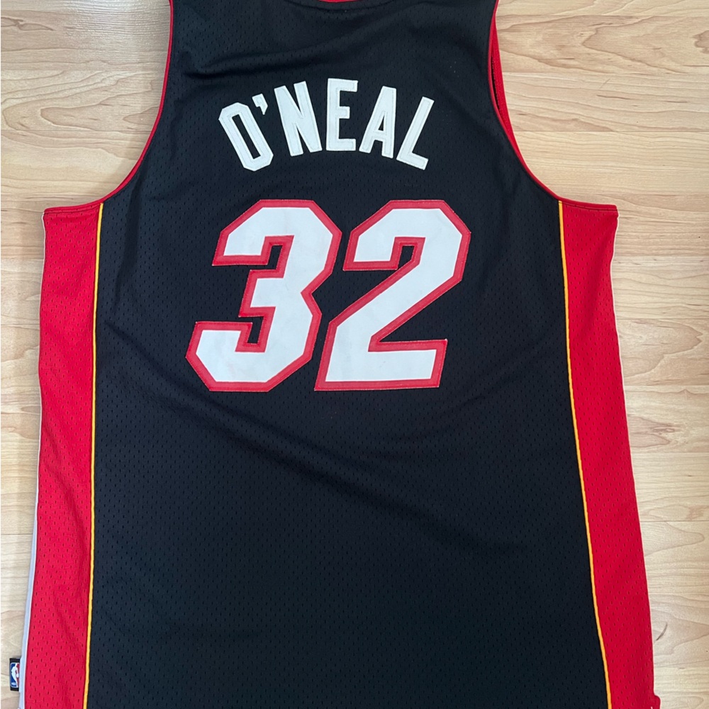 Reebok, size Large, Red/Black Miami Heat Jersey.